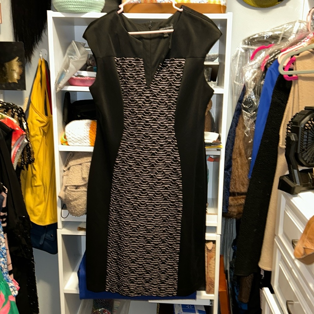 Black and beige connected apparel formal dress, flattering and comfortable.